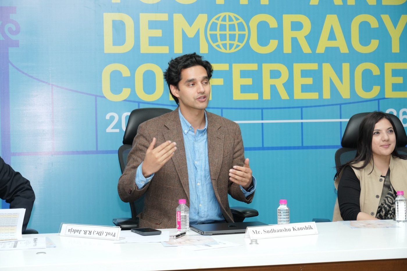 Sudhanshu Kaushik speaking on a conference panel